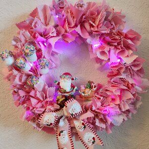 Pink 8" Rag Wreath with Santa Pulling a Sleigh with Pink Fairy Lights